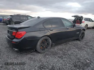 2011 BMW 7 Series 750i xDrive with VIN WBAKC6C54BC395163, listed as a Copart auction lot 82184484 with 74,331 mi miles and Clean title. Bid and sale history available at DreamBid. Image 3.