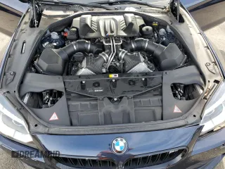 2015 BMW M6 z VIN WBSLZ9C59FD651474, wystawiony jako Copart lot #60882454 z przebiegiem Nie podano mil oraz Szkody całkowita. Historia ofert i sprzedaży dostępna na DreamBid. Obrazek 11.