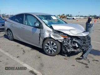 2022 Toyota Prius LE z VIN JTDKAMFP0N3218382, wystawiony jako IAAI lot #42370524 z przebiegiem 36 988 mil mil oraz . Historia ofert i sprzedaży dostępna na DreamBid. Obrazek 1.