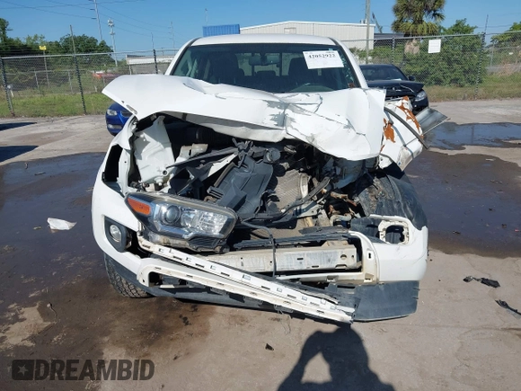 2017 Toyota Tacoma SR5 with VIN 5TFAZ5CNXHX044976, listed as a IAAI auction lot 42052922 with 149,116 mi miles and . Bid and sale history available at DreamBid. Image 6.