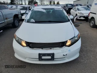 2012 Honda Civic z VIN 2HGFB2F44CH034163, wystawiony jako Copart lot #84198064 z przebiegiem 180 135 mil mil oraz Czysty tytuł • Clean title. Historia ofert i sprzedaży dostępna na DreamBid. Obrazek 5.