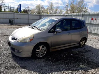 2007 Honda Fit Sport z VIN JHMGD38617S053123, wystawiony jako Copart lot #49042434 z przebiegiem 258 288 mil mil oraz Czysty tytuł • Clean title. Historia ofert i sprzedaży dostępna na DreamBid. Obrazek 1.