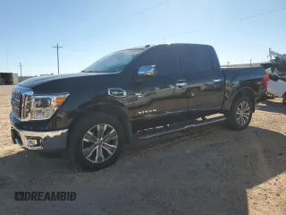2017 Nissan Titan SL z VIN 1N6AA1E54HN554049, wystawiony jako Copart lot #81404094 z przebiegiem 97 811 mil mil oraz Czysty tytuł • Clean title. Historia ofert i sprzedaży dostępna na DreamBid. Obrazek 1.