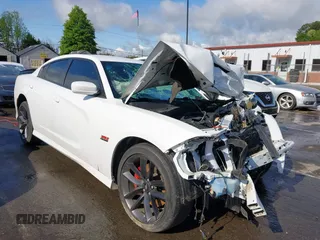 2019 Dodge Charger Scat Pack with VIN 2C3CDXGJ3KH558856, listed as a IAAI auction lot 42009847 with 62,546 mi miles and . Bid and sale history available at DreamBid. Image 1.