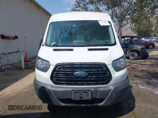 2019 Ford Transit with VIN 1FTYR2CM5KKB19415, listed as a IAAI auction lot 42129144 with 198,457 mi miles and . Bid and sale history available at DreamBid. Image 11.