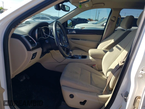 2018 Jeep Grand Cherokee Altitude with VIN 1C4RJFAG2JC258264, listed as a Copart auction lot 55262915 with 102,633 mi miles and Salvage title. Bid and sale history available at DreamBid. Image 7.