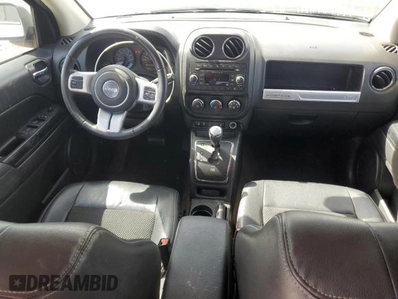 2016 Jeep Compass Sport SE z VIN 1C4NJCBA4GD711214, wystawiony jako Copart lot #49621615 z przebiegiem 105 498 mil mil oraz Szkoda całkowita • Salvage title. Historia ofert i sprzedaży dostępna na DreamBid. Obrazek 8.