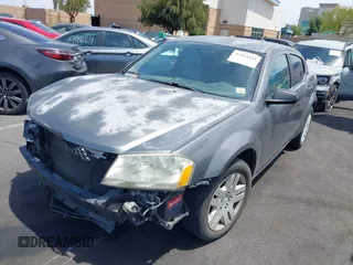 2012 Dodge Avenger SE with VIN 1C3CDZAB0CN247553, listed as a IAAI auction lot 42164424 with 103,463 mi miles and . Bid and sale history available at carsss.com. Image 2.