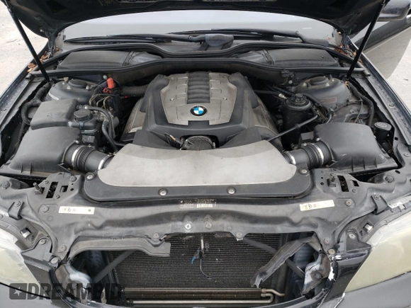 2006 BMW 7 Series 750Li z VIN WBAHN83526DT29128, wystawiony jako Copart lot #83745544 z przebiegiem 155 589 mil mil oraz Szkoda całkowita • Salvage title. Historia ofert i sprzedaży dostępna na DreamBid. Obrazek 11.