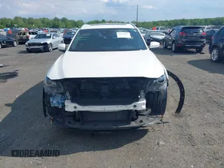 2021 Mazda CX-9 Grand Touring z VIN JM3TCBDY2M0541290, wystawiony jako IAAI lot #42216643 z przebiegiem 38 661 mil mil oraz . Historia ofert i sprzedaży dostępna na DreamBid. Obrazek 12.