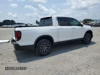 2023 Honda Ridgeline RTL-E with VIN 5FPYK3F7XPB027874, listed as a Copart auction lot 63771315 with 11,945 mi miles and Salvage title. Bid and sale history available at DreamBid. Image 3.