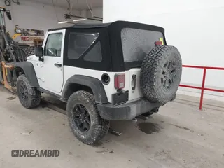 2016 Jeep Wrangler Sport with VIN 1C4AJWAG9GL261958, listed as a IAAI auction lot 41595490 with 32,433 mi miles and . Bid and sale history available at carsss.com. Image 3.