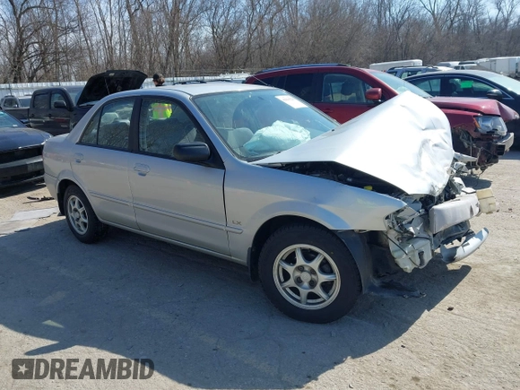 2000 Mazda Protege DX with VIN JM1BJ2227Y0240819, listed as a IAAI auction lot 41810228 with 68,650 mi miles and . Bid and sale history available at DreamBid. Image 1.