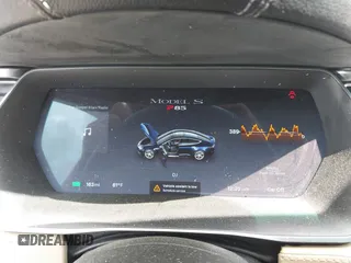 2014 Tesla Model S 60 with VIN 5YJSA1H15EFP43884, listed as a IAAI auction lot 41993180 with 78,305 mi miles and . Bid and sale history available at DreamBid. Image 7.