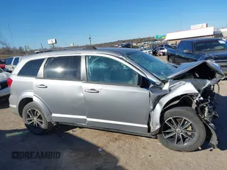 2019 Dodge Journey SE with VIN 3C4PDCBB6KT738488, listed as a IAAI auction lot 41330395 with Not Provided miles and . Bid and sale history available at DreamBid. Image 14.