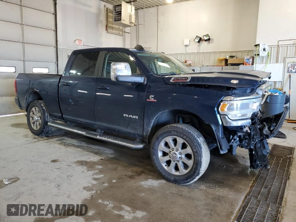 2023 Ram 2500 Laramie with VIN 3C6UR5FL5PG500920, listed as a Copart auction lot 82865454 with 35,330 mi miles and Salvage title. Bid and sale history available at DreamBid. Image 4.