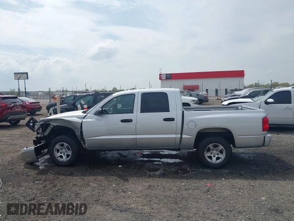 2007 Dodge Dakota SLT with VIN 1D7HE48KX7S122712, listed as a IAAI auction lot 41888864 with 114,384 mi miles and . Bid and sale history available at carsss.com. Image 14.