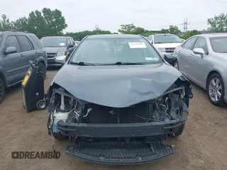 2014 Toyota Corolla L with VIN 2T1BURHE5EC027497, listed as a IAAI auction lot 42602880 with 101,094 mi miles and . Bid and sale history available at DreamBid. Image 12.