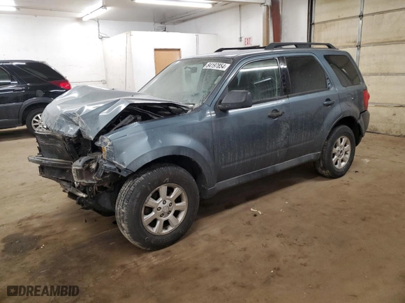 2010 Mazda Tribute Touring with VIN 4F2CY9C72AKM02952, listed as a Copart auction lot 84197854 with 0 mi miles and Salvage Title. Bid and sale history available at carsss.com. Image 1.