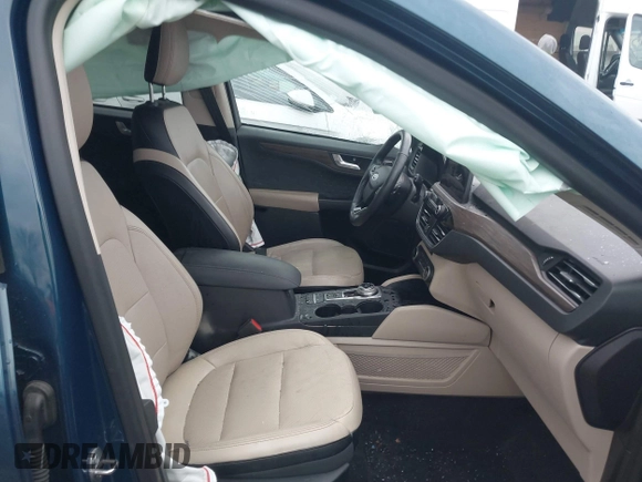 2020 Ford Escape Titanium with VIN 1FMCU9J98LUC00068, listed as a IAAI auction lot 41843755 with 42,525 mi miles and . Bid and sale history available at DreamBid. Image 5.