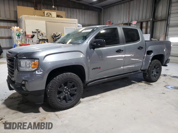 2022 GMC Canyon 4WD AT4 w/Leather with VIN 1GTG6FEN1N1175900, listed as a Copart auction lot 85957514 with 56,811 mi miles and Salvage Title. Bid and sale history available at carsss.com. Image 1.