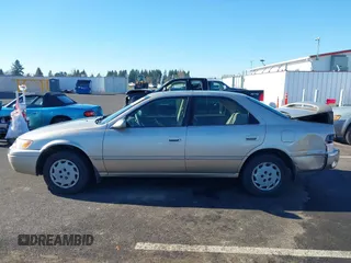 1998 Toyota Camry LE z VIN JT2BG22K3W0151088, wystawiony jako IAAI lot #41429977 z przebiegiem 435 394 mil mil oraz . Historia ofert i sprzedaży dostępna na DreamBid. Obrazek 14.