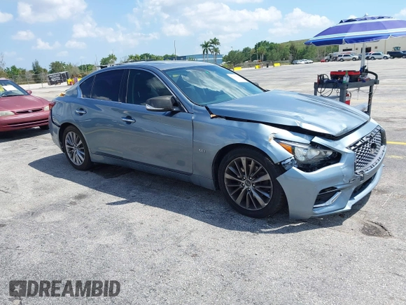 2018 Infiniti Q50 Luxe with VIN JN1EV7AP5JM590494, listed as a IAAI auction lot 41936520 with 101,580 mi miles and . Bid and sale history available at carsss.com. Image 1.