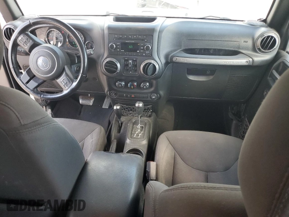 2018 Jeep Wrangler JK Unlimited Sport S with VIN 1C4BJWDG9JL886772, listed as a Copart auction lot 71031344 with 67,891 mi miles and Salvage Title. Bid and sale history available at carsss.com. Image 8.