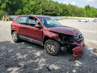 2011 Volkswagen Tiguan S z VIN WVGAV7AX3BW001598, wystawiony jako Copart lot #57518545 z przebiegiem 135 668 mil mil oraz Szkoda całkowita • Salvage title. Historia ofert i sprzedaży dostępna na DreamBid. Obrazek 4.