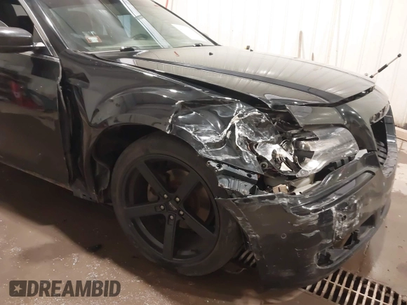 2012 Chrysler 300 S with VIN 2C3CCABG3CH272776, listed as a IAAI auction lot 40252319 with 155,701 mi miles and . Bid and sale history available at carsss.com. Image 6.