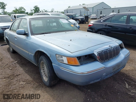 2000 Mercury Grand Marquis LS z VIN 2MEFM75W2YX740018, wystawiony jako IAAI lot #42255754 z przebiegiem 318 651 mil mil oraz . Historia ofert i sprzedaży dostępna na DreamBid. Obrazek 1.