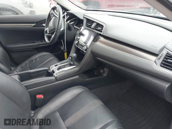 2020 Honda Civic EX-L with VIN 19XFC1F78LE001386, listed as a IAAI auction lot 41961560 with 115,745 mi miles and . Bid and sale history available at DreamBid. Image 5.