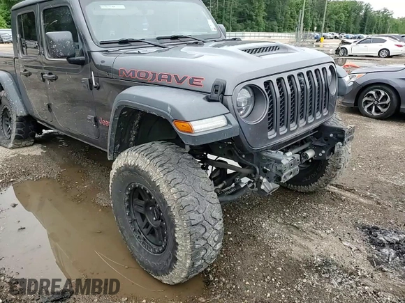 2020 Jeep Gladiator Mojave с VIN 1C6JJTEG4LL206635, выставлен на аукционе Copart как лот 57681805 с пробегом 112 161 миль миль и Списание • Salvage title. История ставок и продаж доступна на DreamBid. Изображение 13.