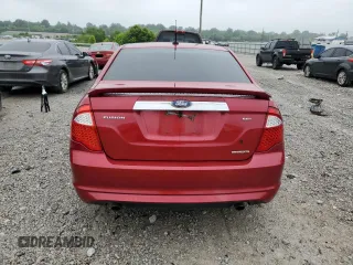 2012 Ford Fusion SEL z VIN 3FAHP0JG2CR309554, wystawiony jako Copart lot #60869895 z przebiegiem 199 134 mil mil oraz Szkoda całkowita • Salvage title. Historia ofert i sprzedaży dostępna na DreamBid. Obrazek 6.