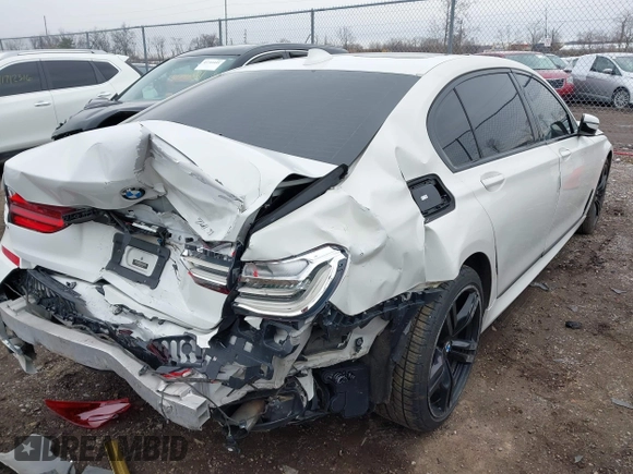 2016 BMW 7 Series 740i with VIN WBA7E2C50GG714647, listed as a IAAI auction lot 41745442 with 134,399 mi miles and . Bid and sale history available at carsss.com. Image 4.