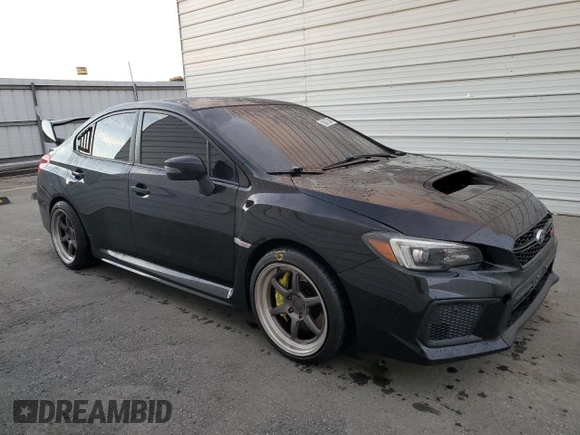2019 Subaru WRX STI with VIN JF1VA2S68K9802381, listed as a Copart auction lot 87599415 with 82,427 mi miles and Clean Title. Bid and sale history available at carsss.com. Image 4.