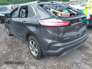 2020 Ford Edge SEL z VIN 2FMPK3J92LBA94128, wystawiony jako IAAI lot #42210326 z przebiegiem Nie podano mil oraz . Historia ofert i sprzedaży dostępna na DreamBid. Obrazek 3.