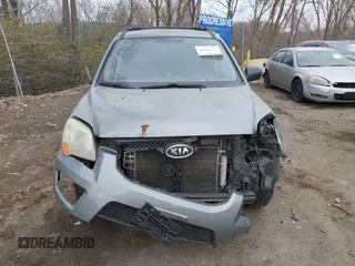 2009 Kia Sportage LX with VIN KNDJF724997570871, listed as a IAAI auction lot 41003267 with 231,654 mi miles and . Bid and sale history available at carsss.com. Image 12.