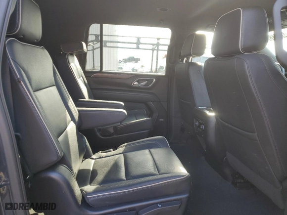 2023 Chevrolet Suburban Premier with VIN 1GNSCFKD5PR394675, listed as a Copart auction lot 49641395 with 56,946 mi miles and Salvage Title. Bid and sale history available at carsss.com. Image 11.