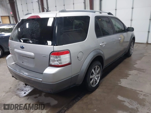 2008 Ford Taurus X SEL with VIN 1FMDK02W88GA12389, listed as a IAAI auction lot 42296138 with 127,484 mi miles and . Bid and sale history available at DreamBid. Image 4.