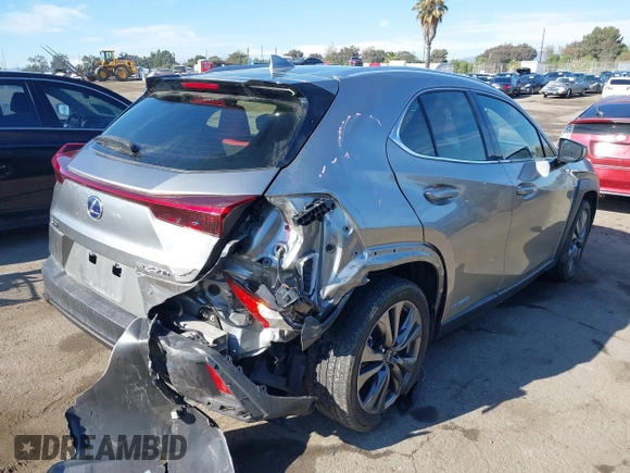 2021 Lexus UX 250h F Sport with VIN JTHE9JBH8M2051954, listed as a IAAI auction lot 40978984 with 60,276 mi miles and . Bid and sale history available at DreamBid. Image 4.