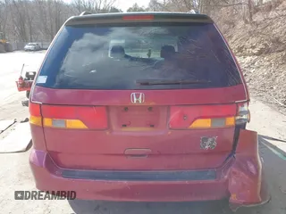 2003 Honda Odyssey EX-L with VIN 5FNRL18923B130410, listed as a IAAI auction lot 41814211 with 209,335 mi miles and . Bid and sale history available at DreamBid. Image 16.