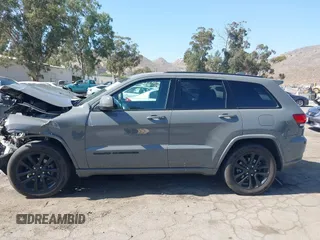 2020 Jeep Grand Cherokee Laredo E with VIN 1C4RJEAG3LC247027, listed as a IAAI auction lot 42538279 with 97,601 mi miles and . Bid and sale history available at DreamBid. Image 14.