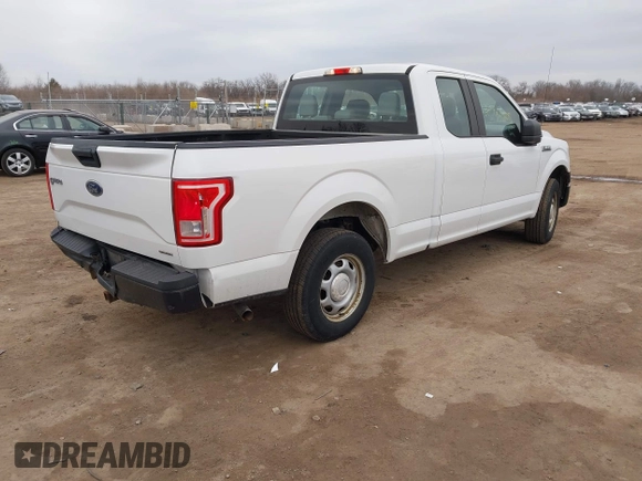 2015 Ford F-150 XL with VIN 1FTEX1C89FFC28643, listed as a IAAI auction lot 41740605 with 317,438 mi miles. Bid and sale history available at carsss.com. Image 4.