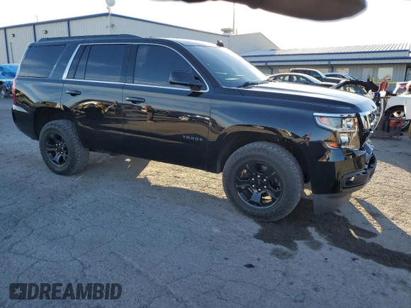2020 Chevrolet Tahoe LS with VIN 1GNSCAKC1LR300537, listed as a Copart auction lot 77272554 with 51,108 mi miles and Salvage title. Bid and sale history available at DreamBid. Image 4.