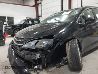 2017 Chrysler Pacifica Touring with VIN 2C4RC1DGXHR585294, listed as a IAAI auction lot 41971914 with 153,028 mi miles and . Bid and sale history available at DreamBid. Image 6.