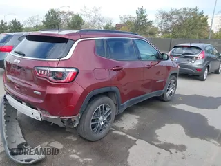 2020 Jeep Compass Latitude with VIN 3C4NJCBB3LT257809, listed as a IAAI auction lot 41736438 with 50,435 mi miles and . Bid and sale history available at DreamBid. Image 4.