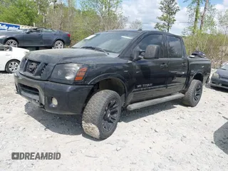 2009 Nissan Titan LE with VIN 1N6BA07D79N317253, listed as a IAAI auction lot 41944642 with 231,896 mi miles. Bid and sale history available at carsss.com. Image 2.
