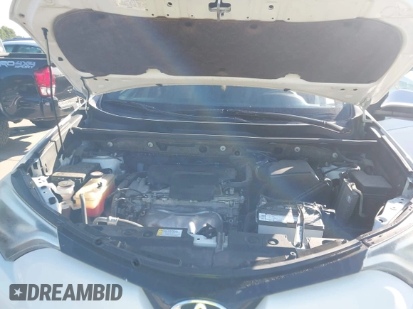 2016 Toyota RAV4 SE with VIN JTMNFREV9GJ069030, listed as a IAAI auction lot 41966346 with 168,417 mi miles and . Bid and sale history available at DreamBid. Image 10.