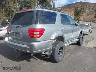 2001 Toyota Sequoia SR5 with VIN 5TDZT34A91S032950, listed as a IAAI auction lot 41406720 with 261,140 mi miles. Bid and sale history available at carsss.com. Image 4.